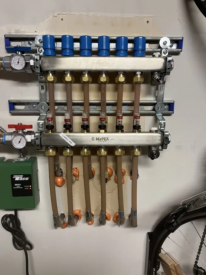 Plumber performing Water Heater Repair at a residential property in Flagler Estates